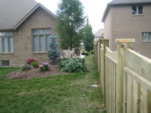 Scalloped wooden fence