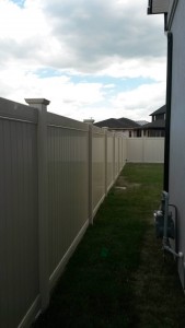 Almond vinyl fence