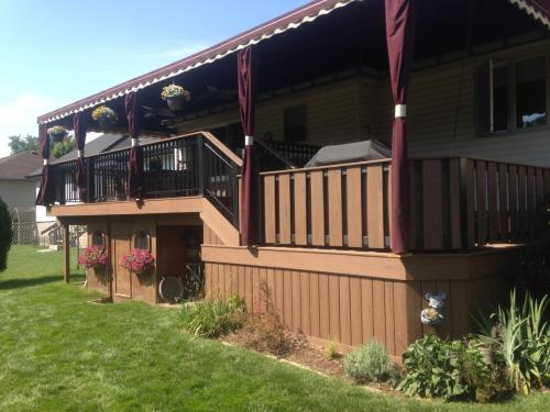 brown oak raised ranch deck
