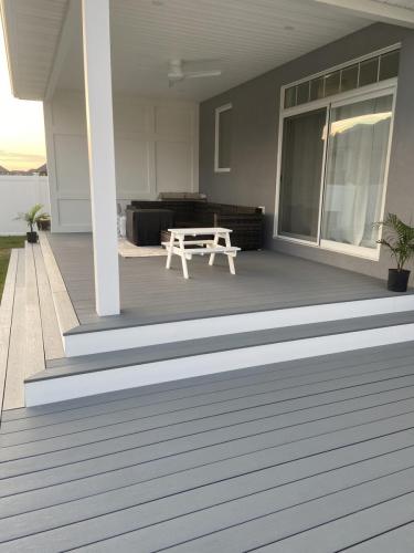traditional white riser timber tech deck