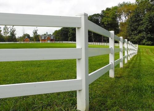White PVC split rail farm fence