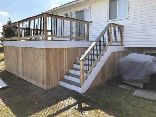 timber tech deck with cedar skirting and railings
